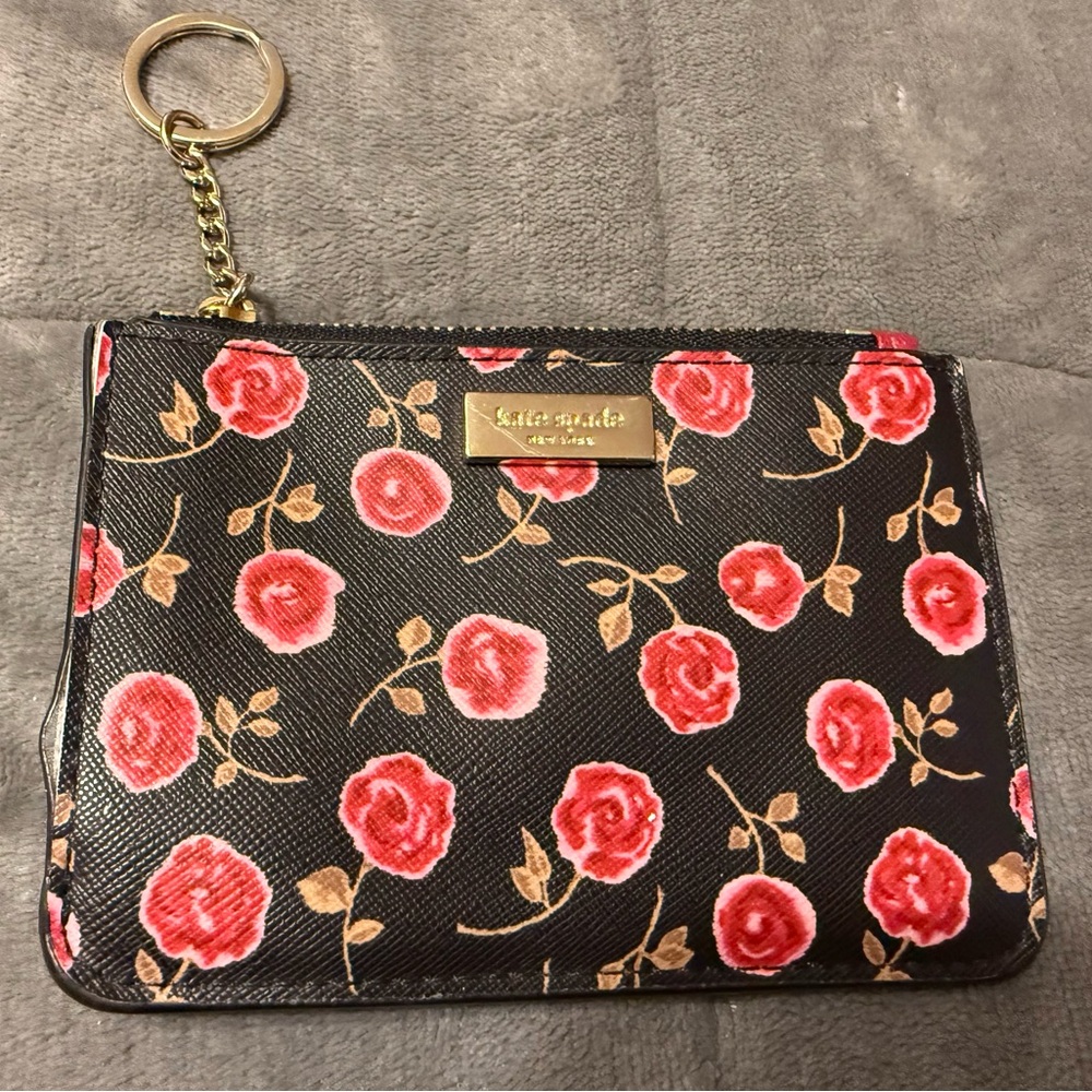Kate Spade Black Wristlet with Red Floral Design